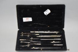 An early 20th century geometry compass set.