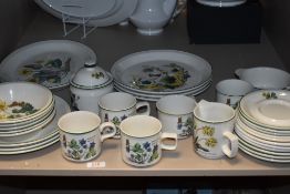A vintage Wedgwood Florabunda pattern part dinner service with similar cups and saucers.