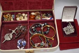 Costume jewellery including a cameo style ring, turquoise stone bangle and earrings.