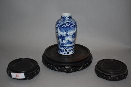 A Chinese export porcelain vase hand decorated with double panel of two people shaking hands, with a