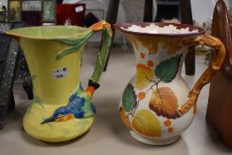 Two Art Deco water jugs including Burleigh ware Kingfisher and Hampton Ivory.