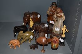 A selection of wooden carved figure and animal studies including Elephant and Bison.