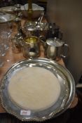 A selection of plated ware, including candlesticks, tray, jugs and more.