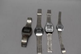 Four men's digital wristwatches including Casio, Saxon and Omac.