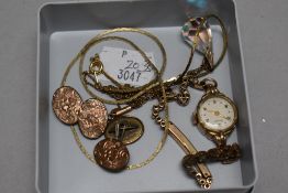 A pair of men's cufflinks with a Rotary wristwatch and yellow metal necklace.