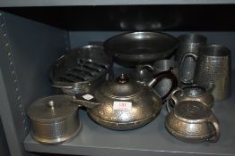 A selection of early 20th century pewter wares including a Craftsman tea set.