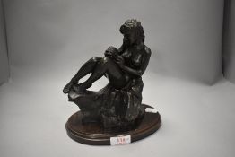 A Heridities 'First love' figurine with wooden base.