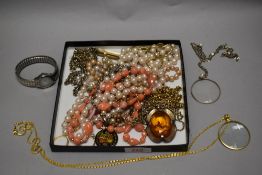 Costume jewellery including a Celtic style pendant necklace, yellow metal necklaces and rings.