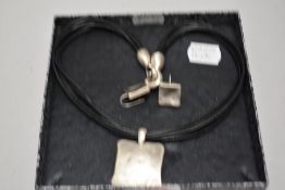 A modern Danon pewter necklace and earring set.