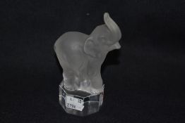 A vintage Goebel glass animal study of a trumpeting elephant.