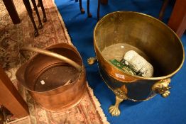 A brass planter , copper coal helmet and cast doorstop modelled as a sheep