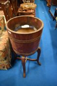 A vintage barrel style planter on stand and a Lovatts jardiniere