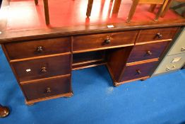 A Victorian style mahogany office desk having skiver leather top , width approx 125cm