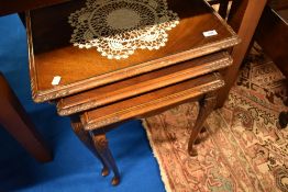A reproduction nest of three tables