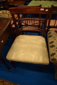 A 19th Century Regency mahogany dining chair having later upholstered seat