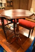 A 19th Century stained frame occasional table having octagonal top and turned column with mace style
