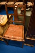 An early 20th Century oak dining chair