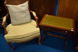 A reproduction Regency coffee table with double frieze drawers and lyre end and a Frenchstyle
