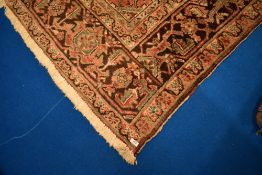 A North West Persian Goravan traditional room carpet square having a large central medallion