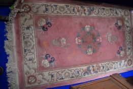 A Chinese fireside rug, approx 173 x 91cm