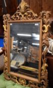 A Victorian giltwood foliate wall mirror