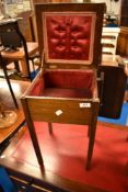 A vintage oak sewing table