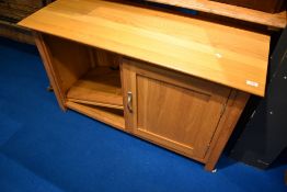 A modern golden oak TV cabinet, width approx. 110cm