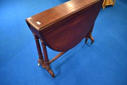 A Victorian mahogany Sutherland style gateleg table having turned frae and pot castors, width approx