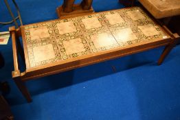 A vintage tile top coffee table