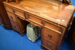 A Priory style oak three piece bedroom suite