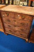 A 19th century chest of two over three drawers (feet dog chewed)