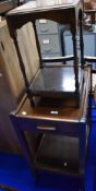 An early 20th Century oak tea trolley and a similar occasional table/plant stand