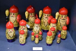 A set of four graduated Mid Century Russian 'USSR' folk art matrioska dolls hand painted in a
