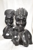 Two large early 20th century African carved figure busts of tribal villagers both aprox 35cm tall.