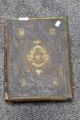 A large Victorian John Brown Family bible bound in leather.
