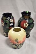 Two modern Country Craft Collection vases with a similar Tupton ware vase.