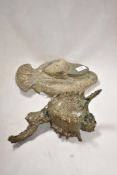Two pieces of vintage studio pottery including a sea shell and a sea bird.