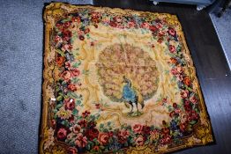 An early 20th century bed throw with a printed design.