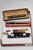 Six early 20th century fountain and ink pens including Parker, Vacumatic, Esterbrook and Swan.