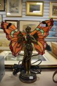 A modern mythical figural light in the form of a fairy butterfly in an Art Nouveau style.