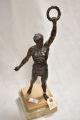 An early 20th century Bronze style figure of a Roman Olympian on marble and beech wood base.