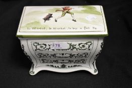 An early 20th century Royal Doulton Huntley and Palmers advertising container in the form of a