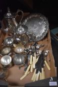 A selection of silver plated tea wares including serving tray, cutlery and tea pots.