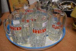 A selection of 1970's beer mugs including Watneys Red and Carlsberg