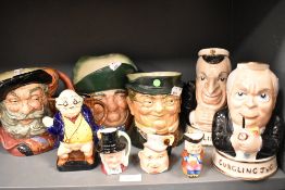 A selection of character mugs including two Price Kensington Gurgling jugs.