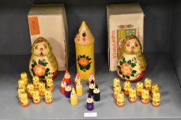 Three sets of Mid Century Russian 'USSR' folk art matrioska style dolls hand painted in a