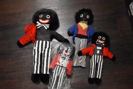 Four vintage soft toys in a Robertsons Jam style.