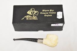 A vintage Pilgrim Winston Churchill tobacco pipe with original box.