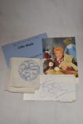 A signed Cilla Black chocolate wrapper with envelope and a facsimile photograph.