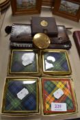 A selection of vintage make up compacts and leather purse.